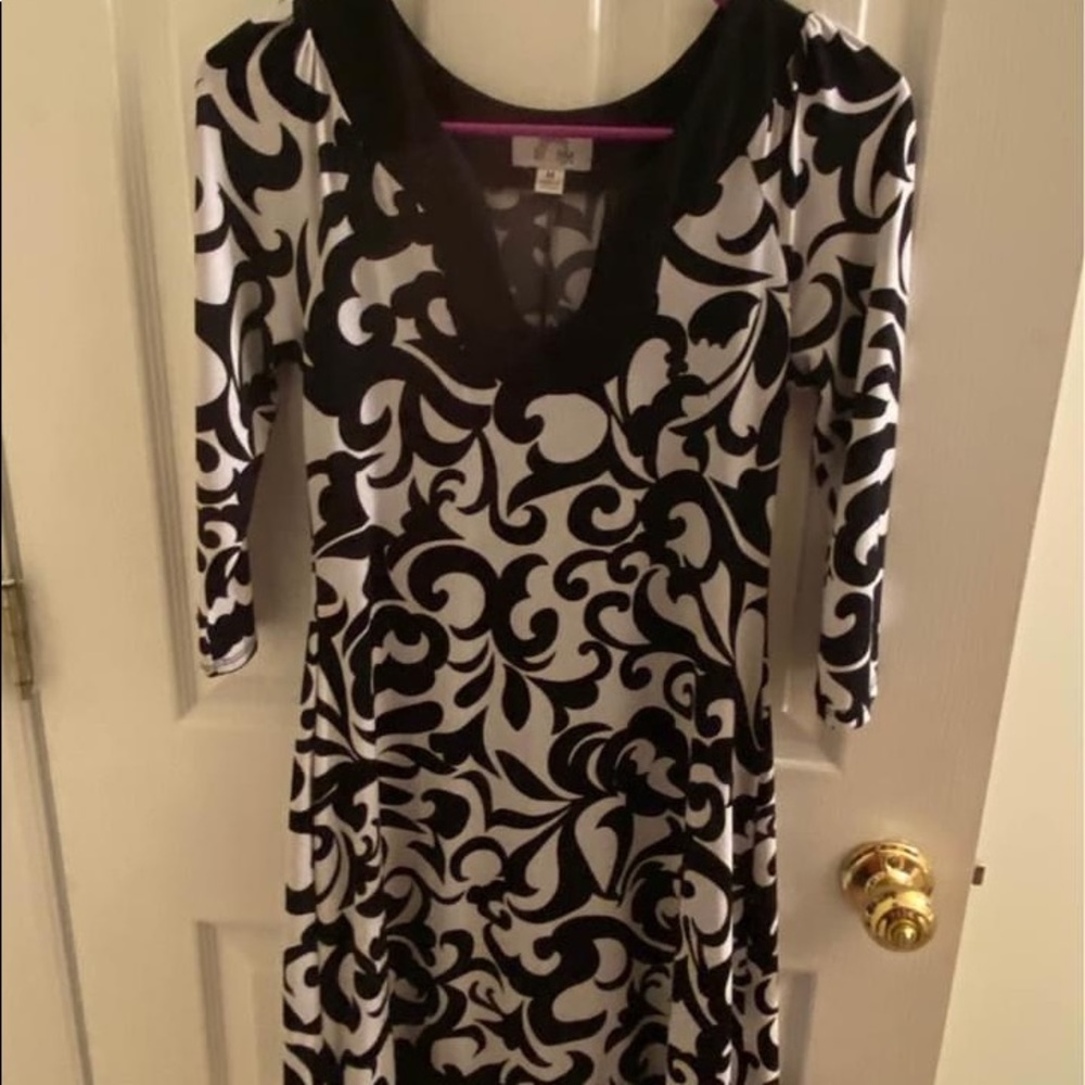Short, sexy, plunging neckline, size medium